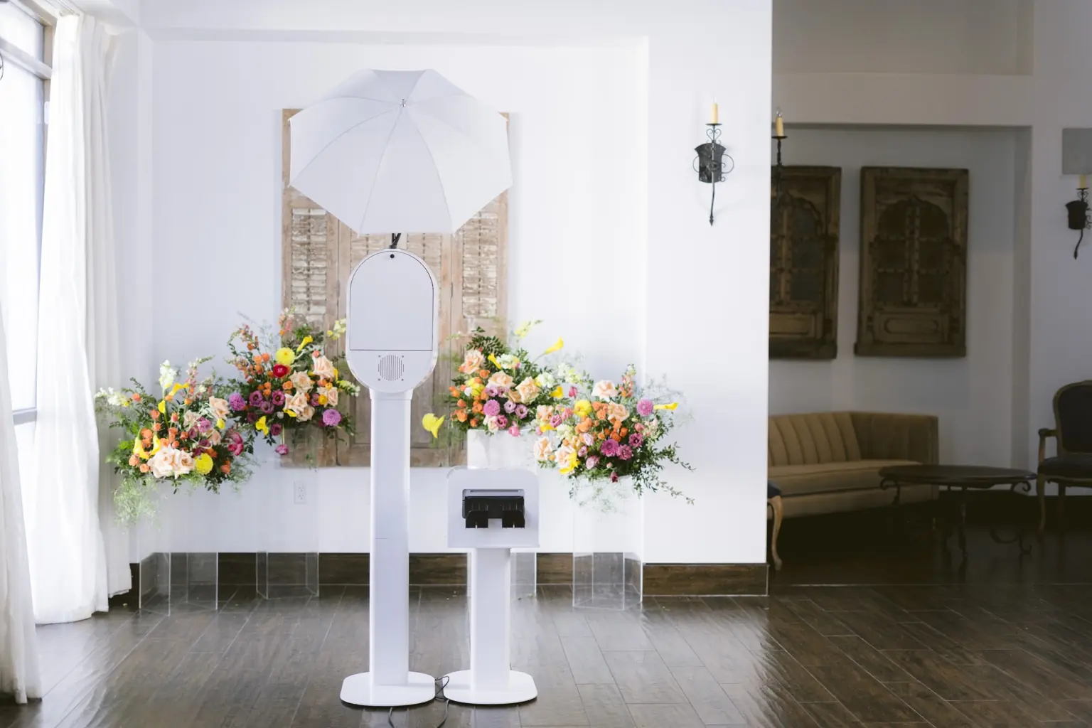 Studio Flor floral backdrop and open-air booth setup.
